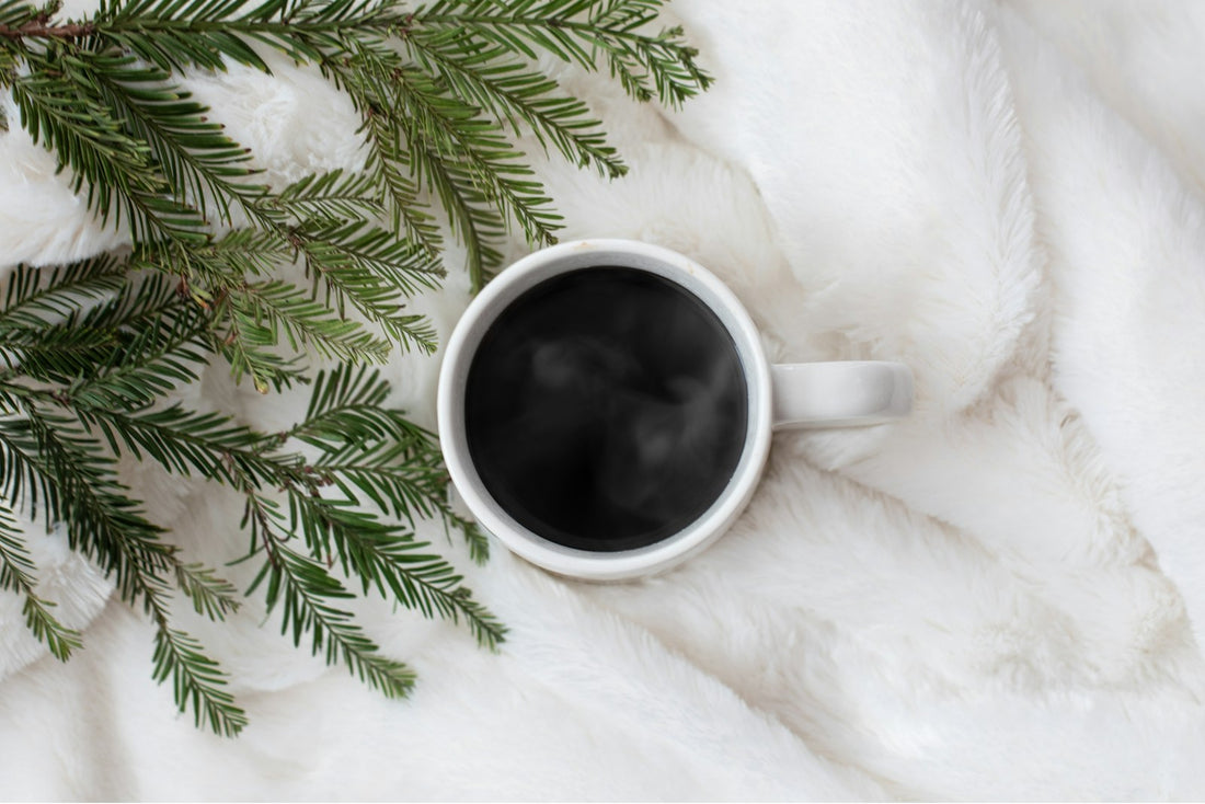 Black coffee in a white ceramic mug, a calm morning ritual